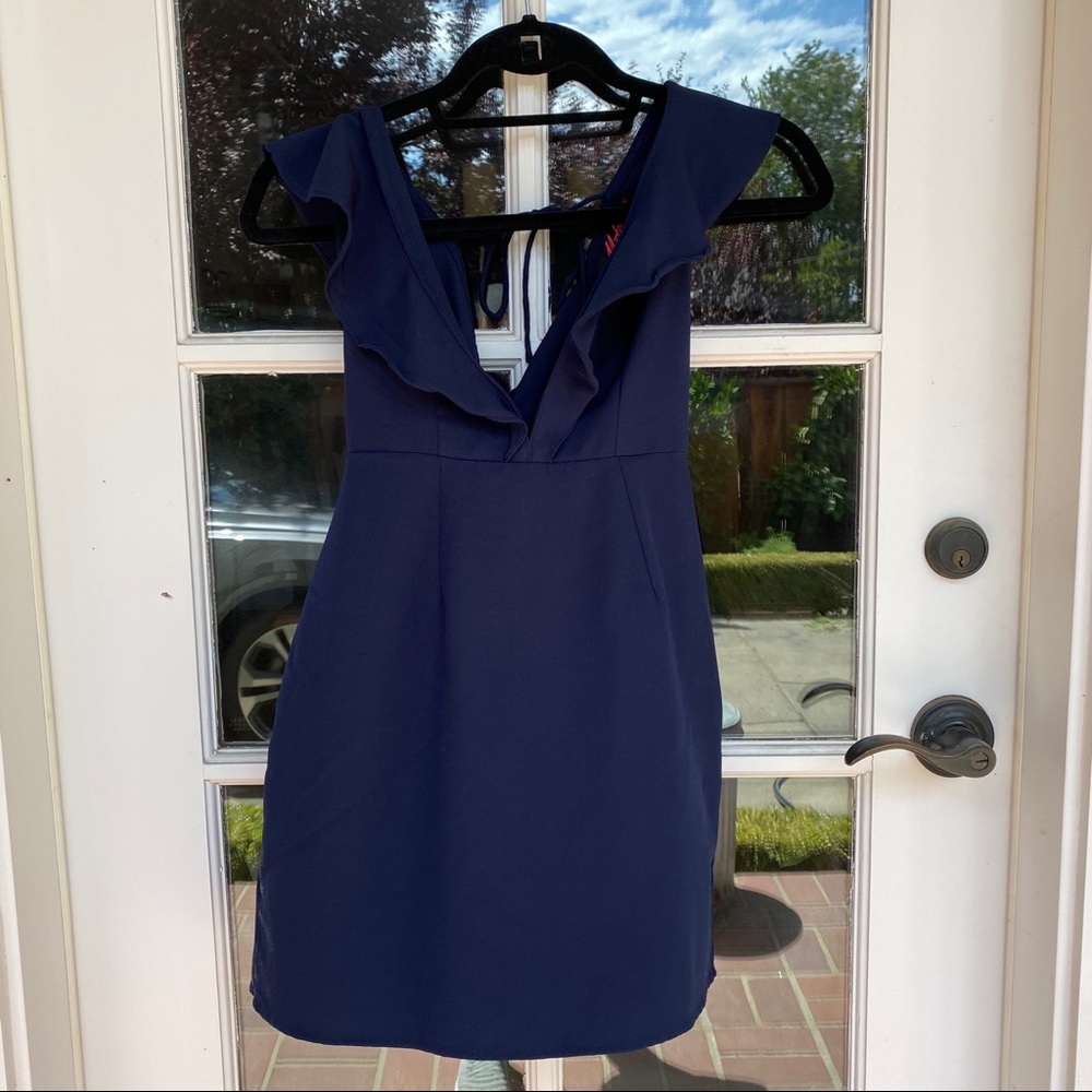 Motel navy dress with ruffle detail